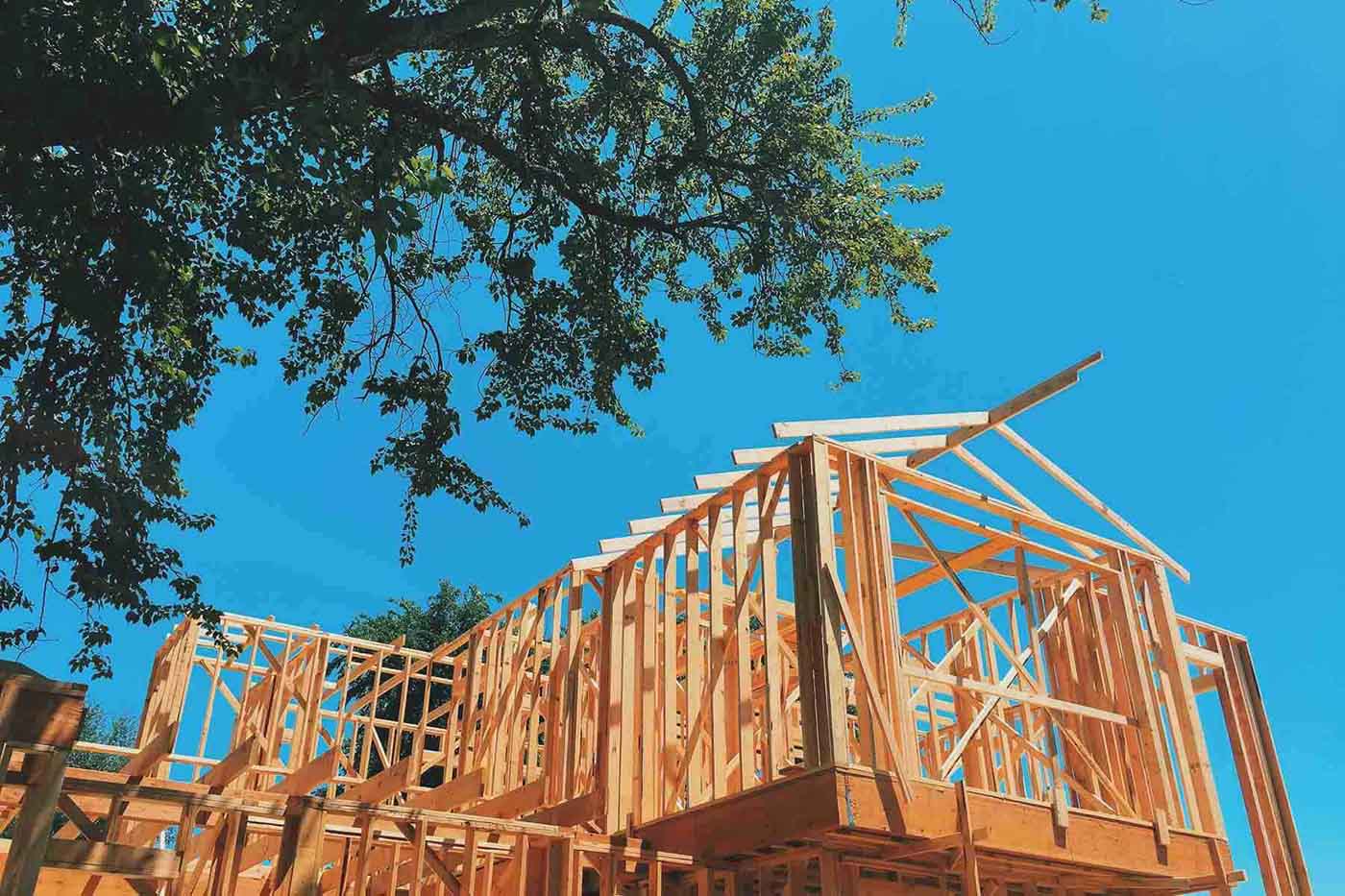 New construction exterior view of an unfinished home