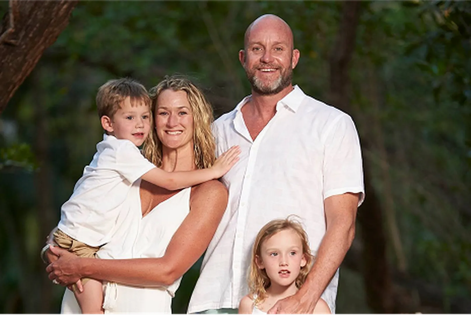 Andrew Kellam, Branch Manager and Loan Officer, posing with his family.