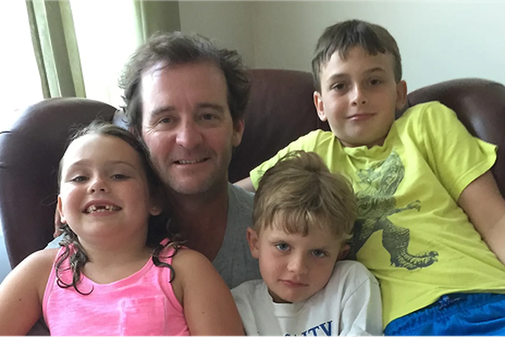 Brad Shoemaker, Sales Manager and Senior Loan Officer, with his children.