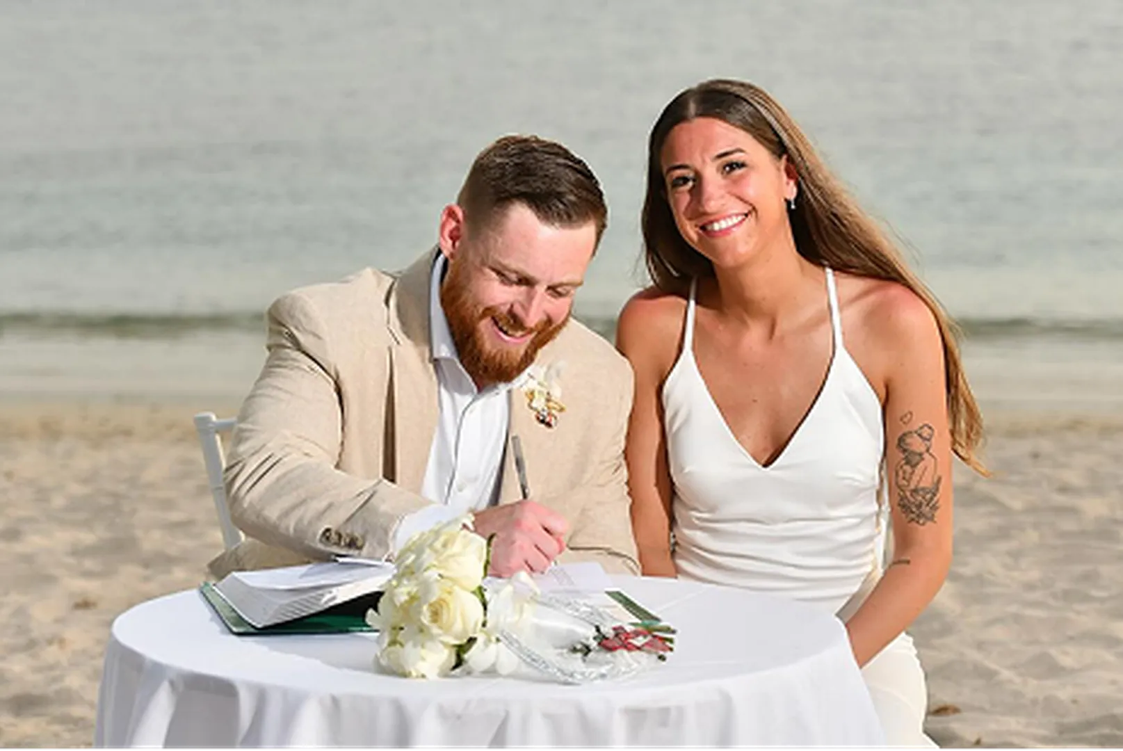 Brandon Reilly, Mortgage Loan Officer, pictured smiling with his wife.