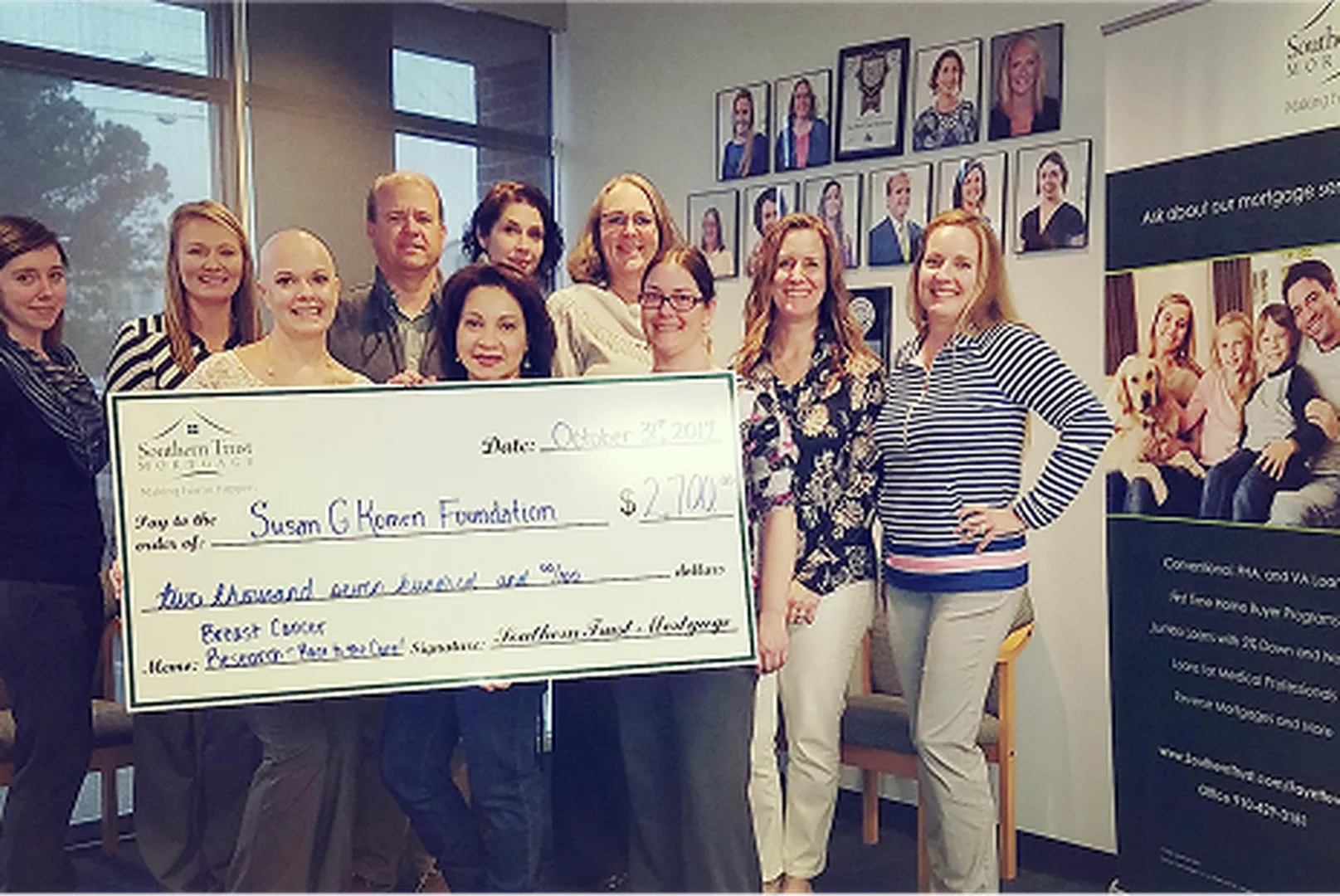 Brian Canady, Branch Manager and Mortgage Loan Officer, with his client.