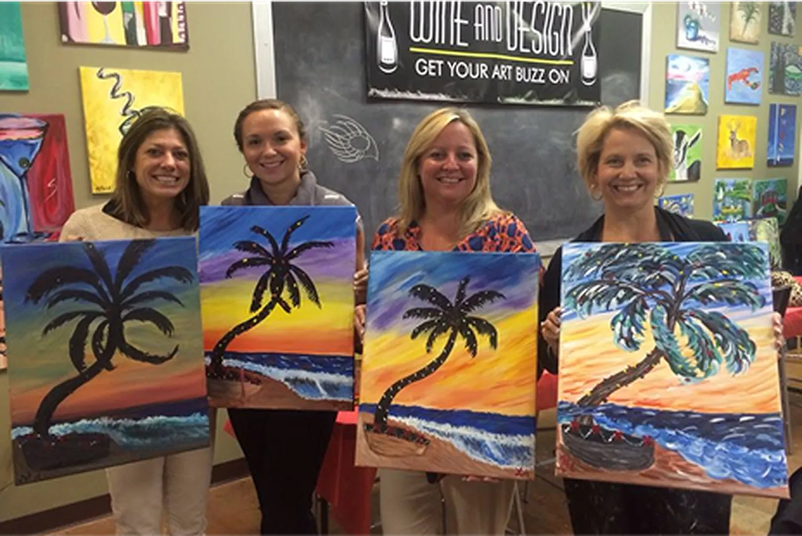 Dale Lacy, Mortgage Loan Officer, with three others holding mounted art.