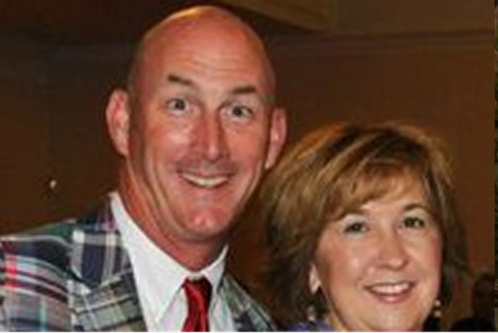 Dennis Sullivan, President of Southern Trust Mortgage LLC, pictured with his wife.