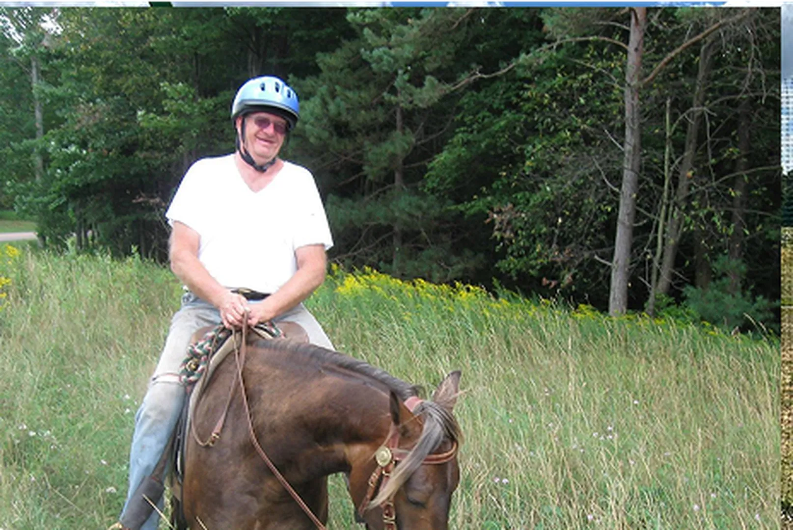 Don Ryan, Senior Loan Officer, riding a horse.