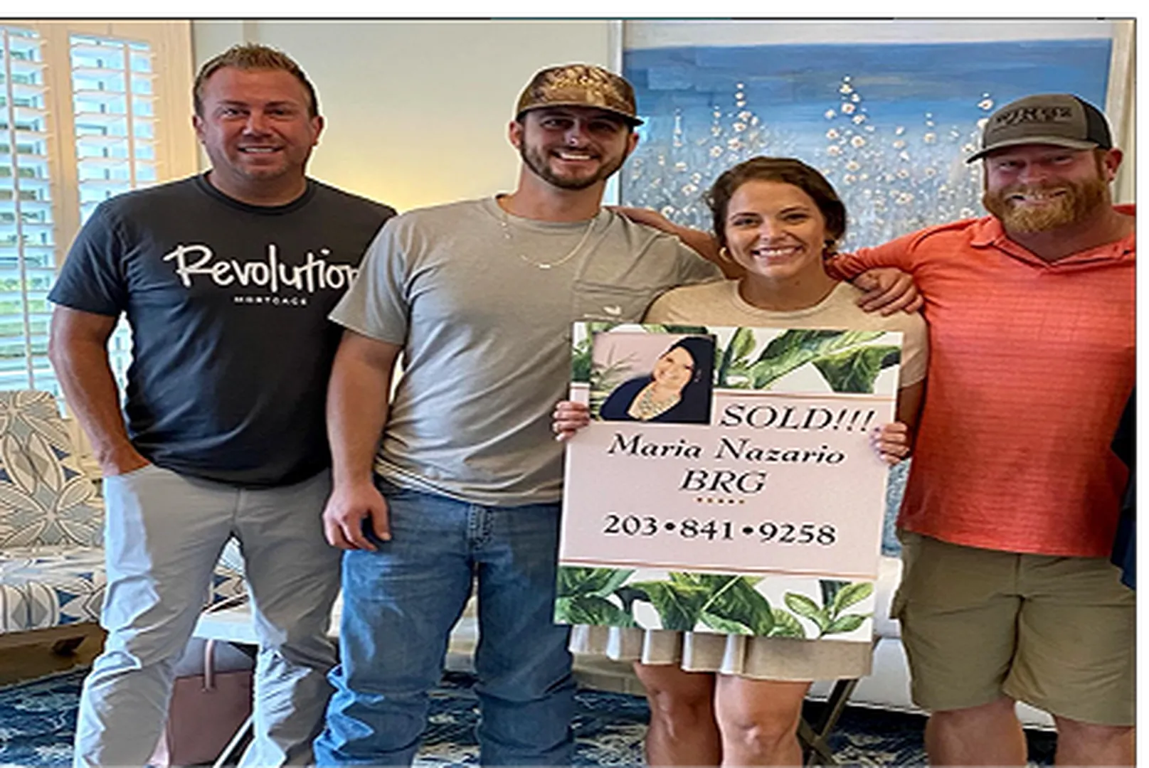 Jason King, Mortgage Loan Officer, with his client.