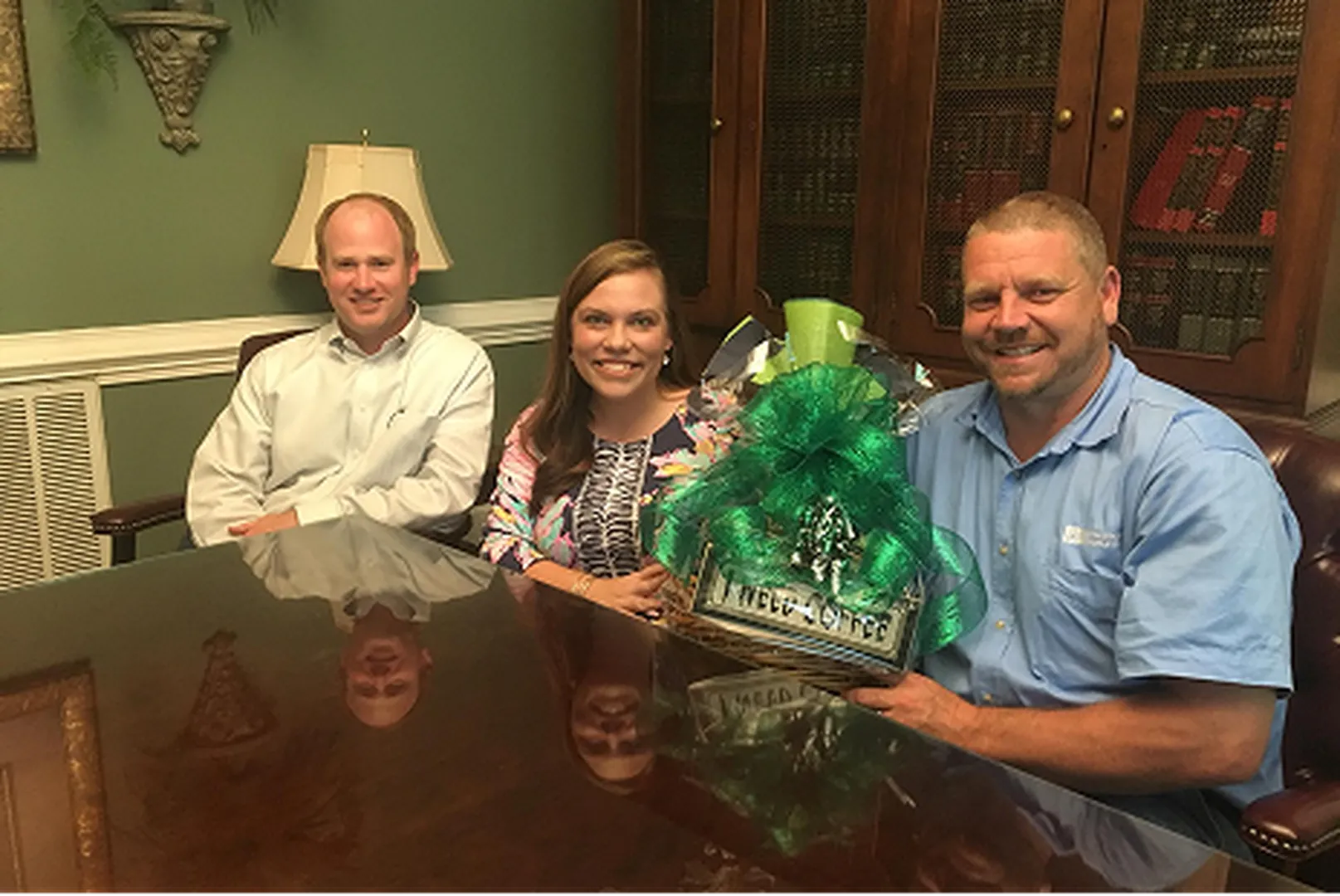 Jeremy White, Mortgage Loan Officer, with his client.