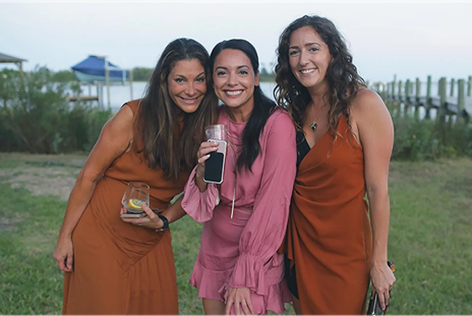 Kelly Barnes, Mortgage Loan Officer, with her family posing outdoors.