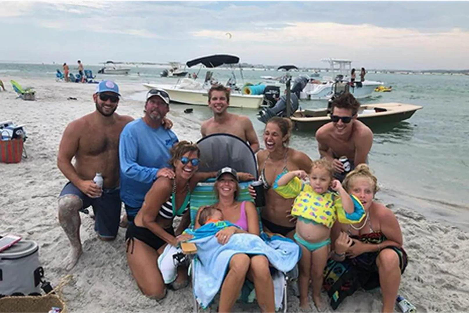 Libby Tamson, Mortgage Loan Officer, with her family members on the beach.