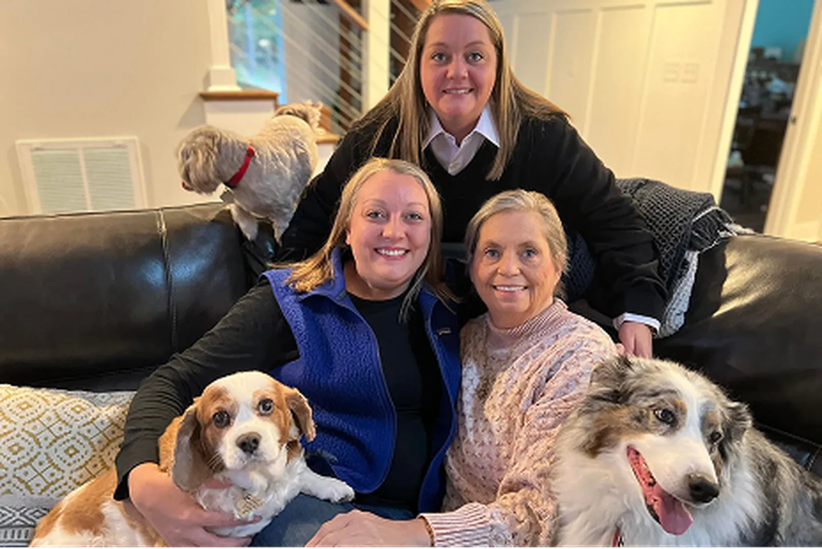 Mandy Moore, Mortgage Loan Officer, pictured with her family and their pets.