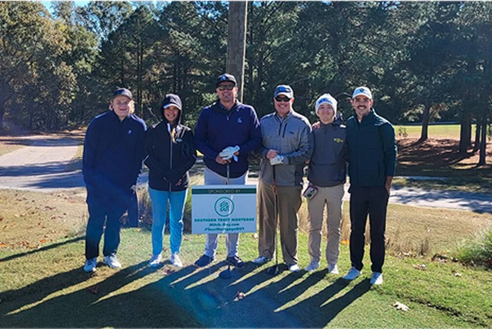 Mitch Guy, Mortgage Loan Officer, with his team.