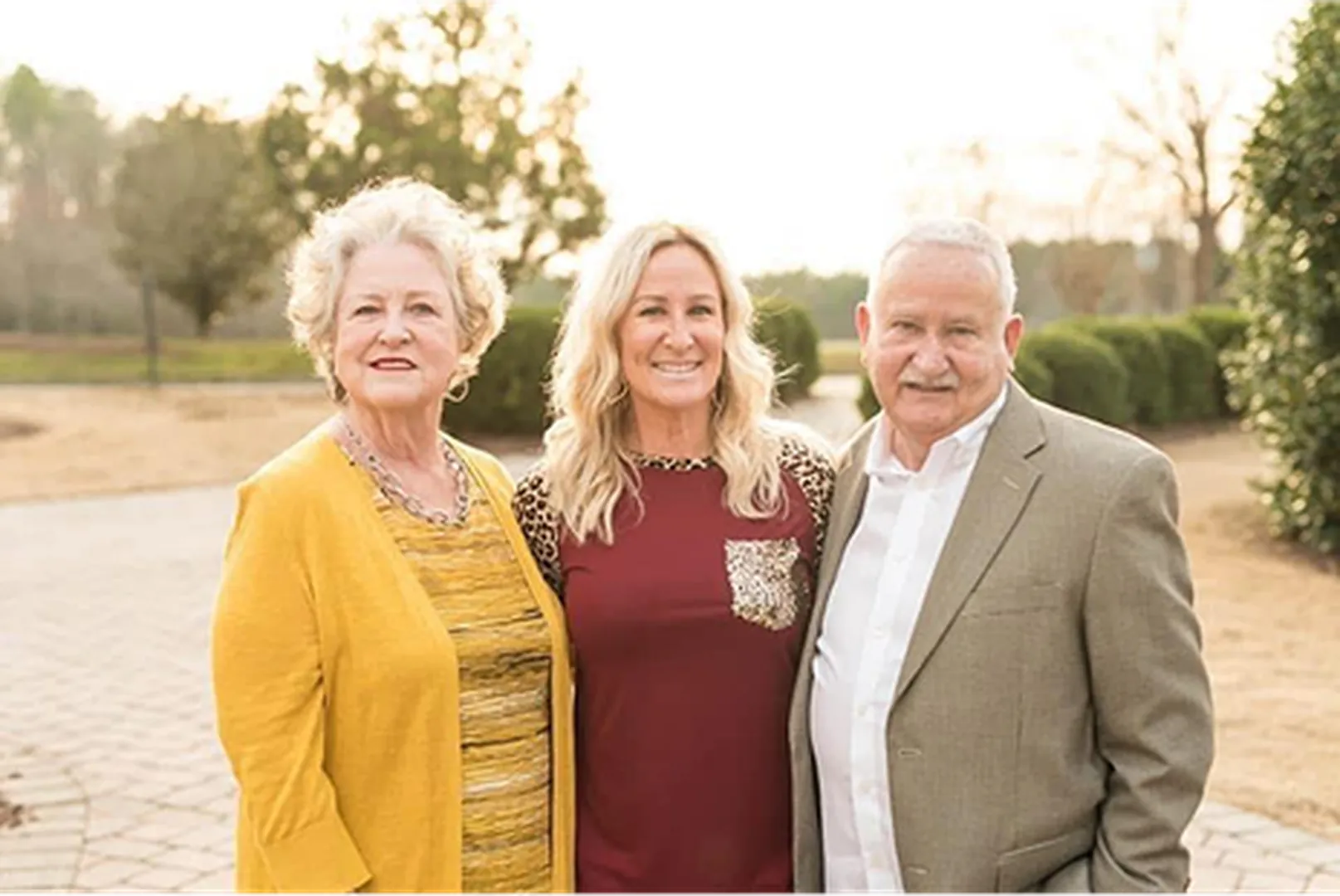 Monaca Vanderpool, Mortgage Loan Officer, pictured with her parents.