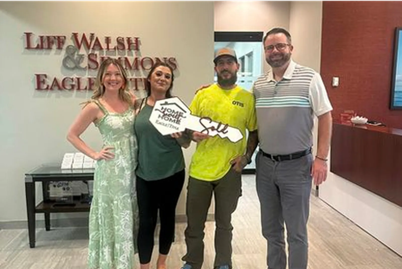 Rick Hennen, Producing Area Manager, with his client.