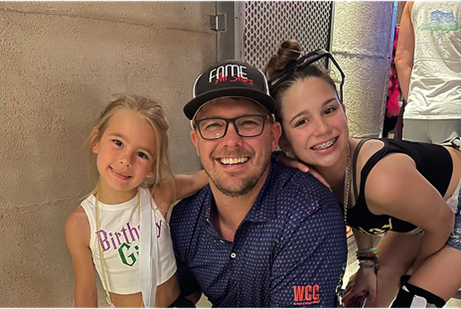 Robert Magruder, Mortgage Loan Officer, pictured smiling with his daughters.