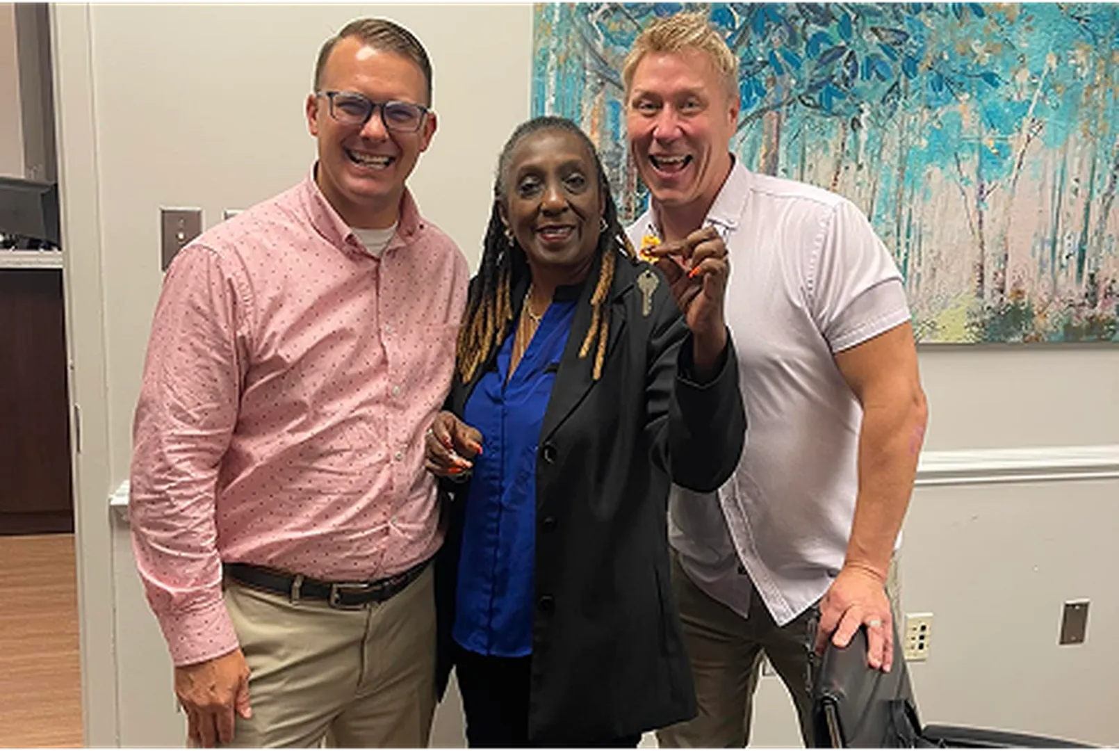 Robert Magruder, Mortgage Loan Officer, with his client.