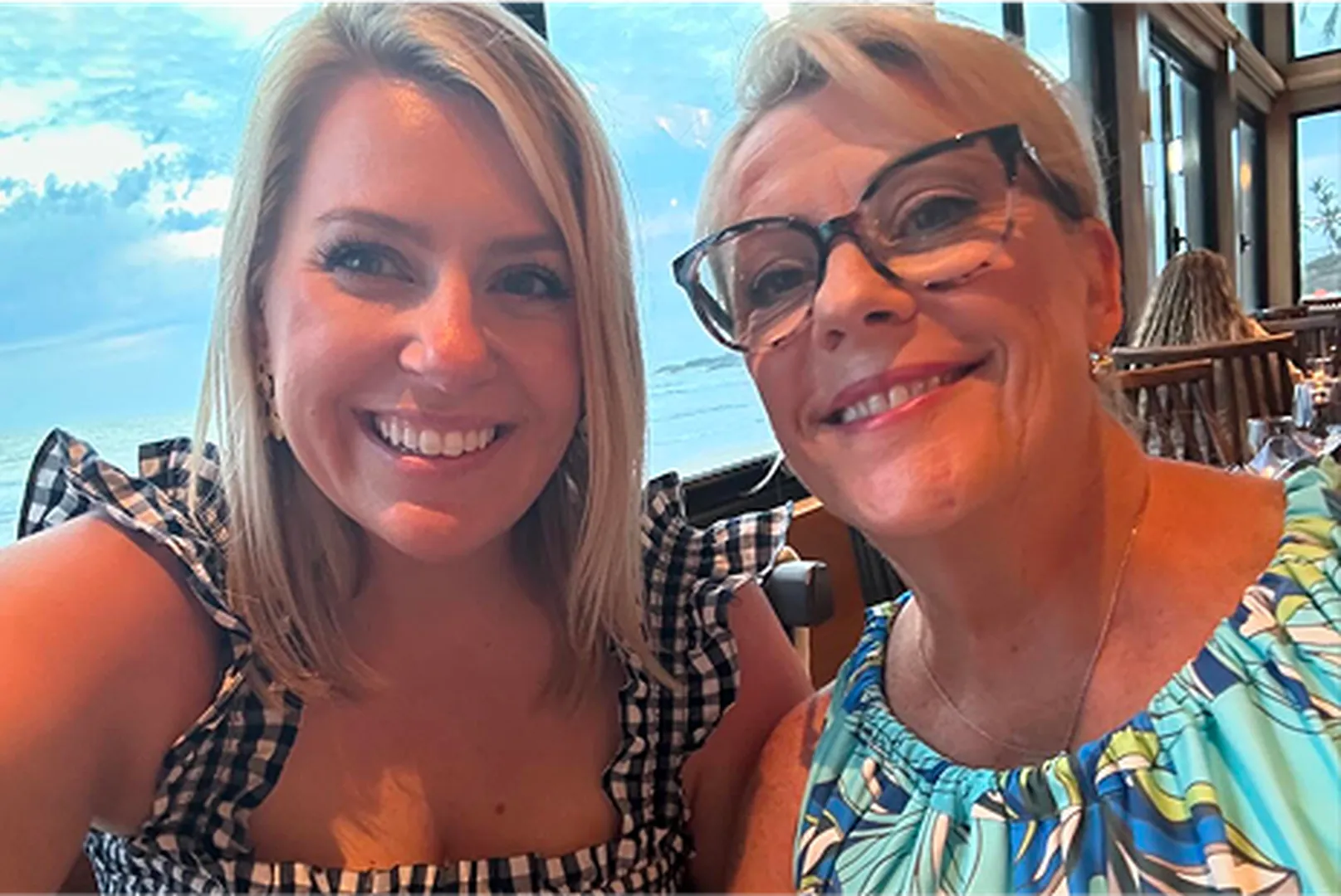 Ryann McLean, Mortgage Loan Officer, pictured smiling with her family member.