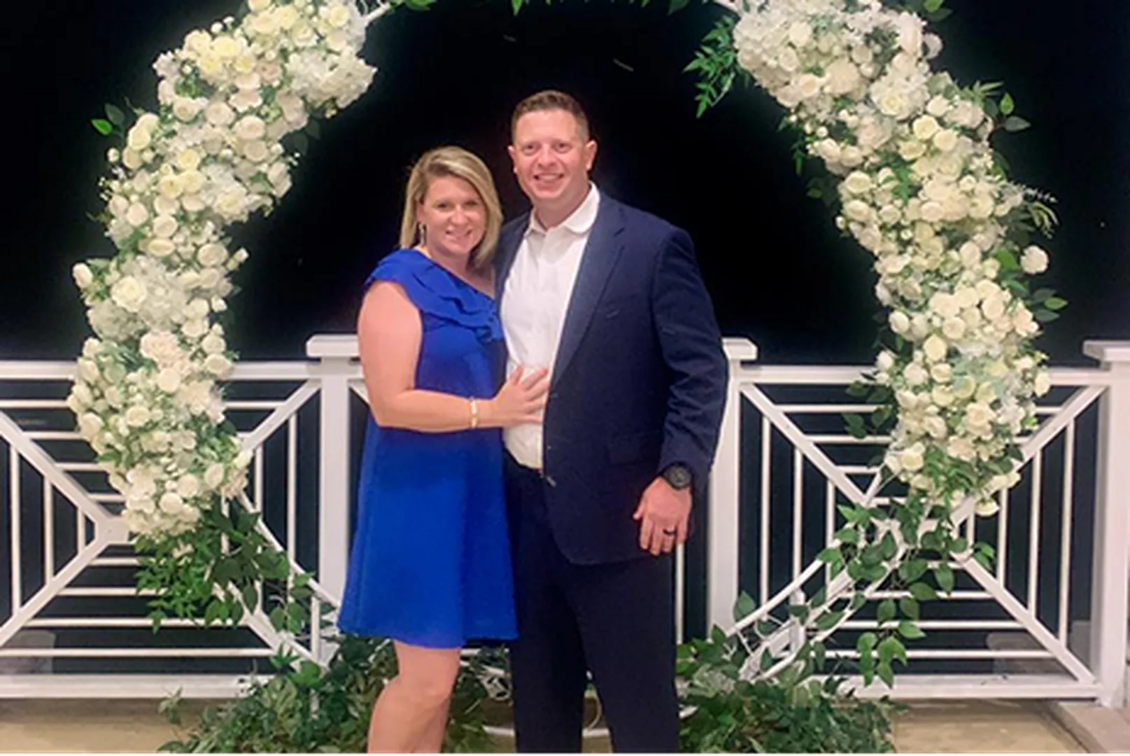 Taylor Flowers, Mortgage Loan Officer, with his wife.