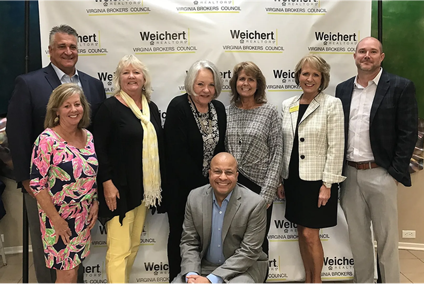 Trey Cooper, Mortgage Loan Officer, with his client.